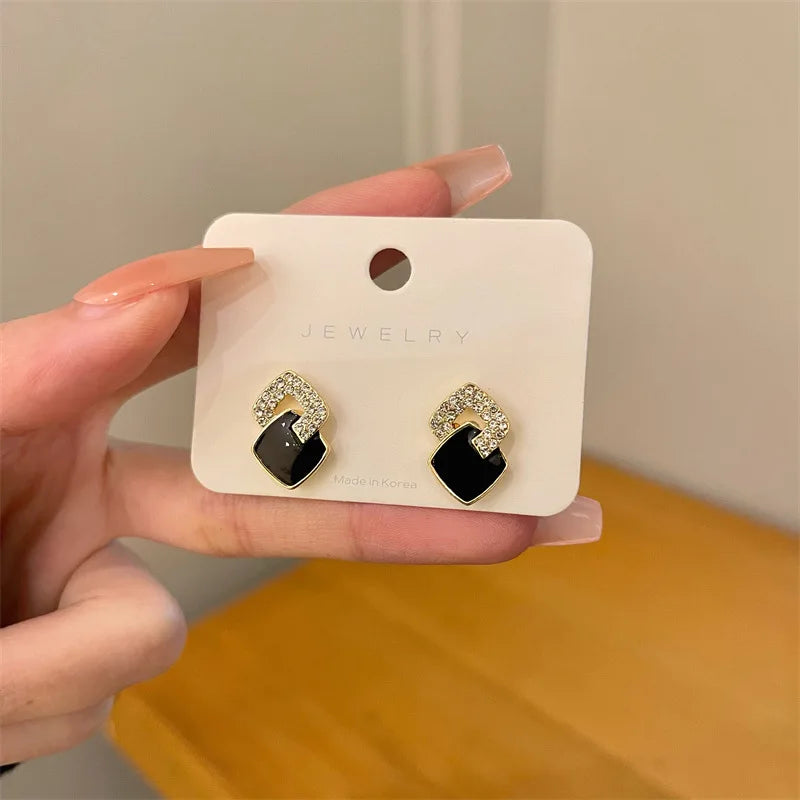Asymmetrical Hollow Stud Rhinestones Earrings