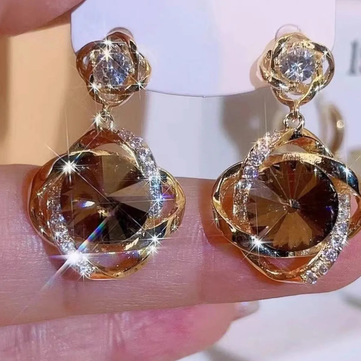 Interlocking Ring Drop Earrings – Champagne Crystal