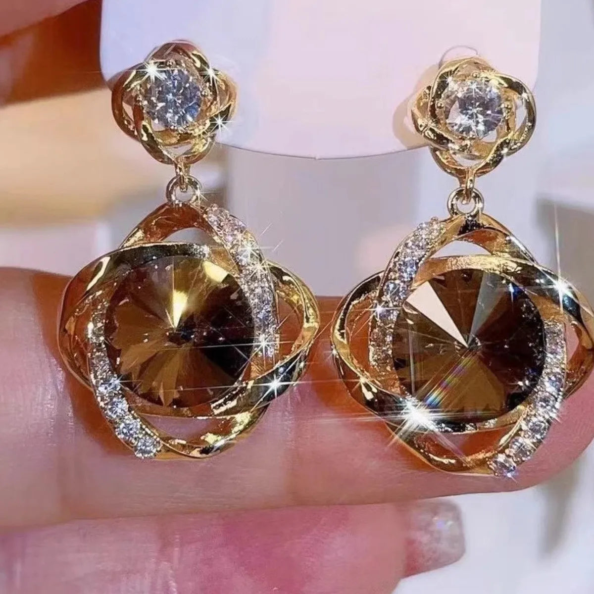 Interlocking Ring Drop Earrings – Champagne Crystal