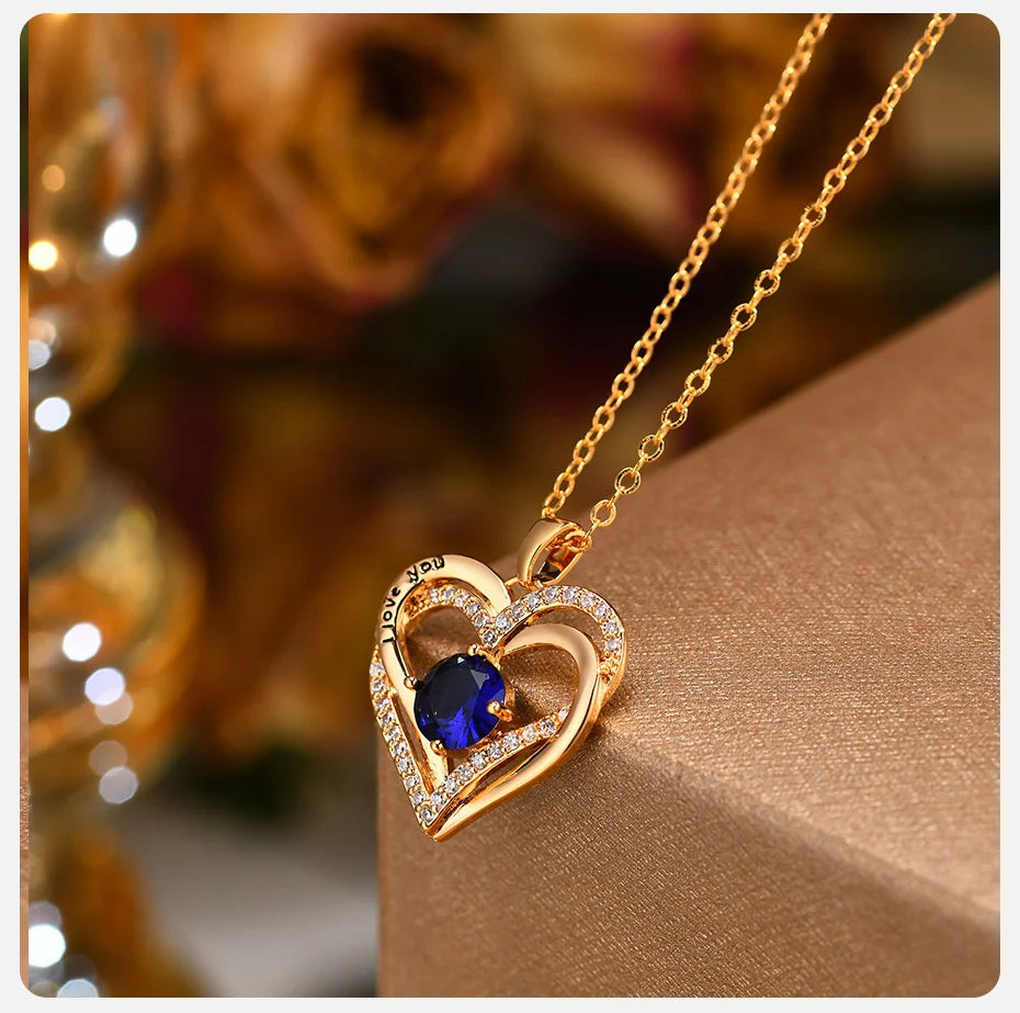 Double Crossed Hearts Necklace – Gold & Enamel Pendant